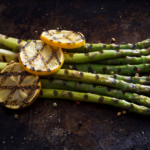 Grilled asparagus with seasoning and lemon slices
