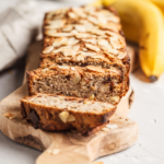 Homemade vegan banana bread with almonds and chocolate
