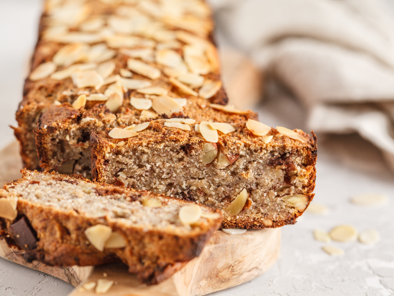 Homemade vegan banana bread with almonds and vegan chocolate