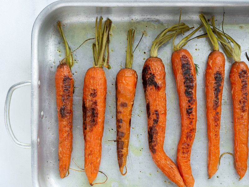 Roasted carrots with glaze and garnish