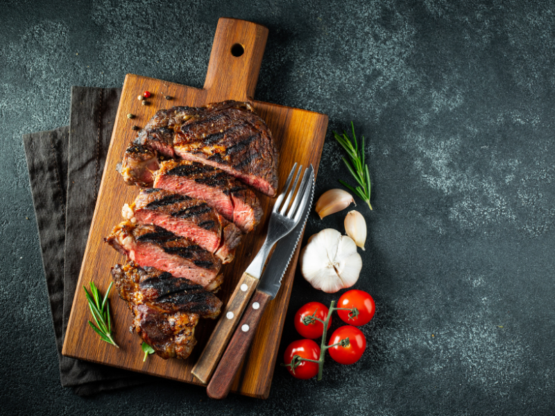 Ribeye steak on gas grill